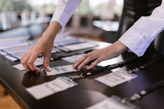 conference badges on a table